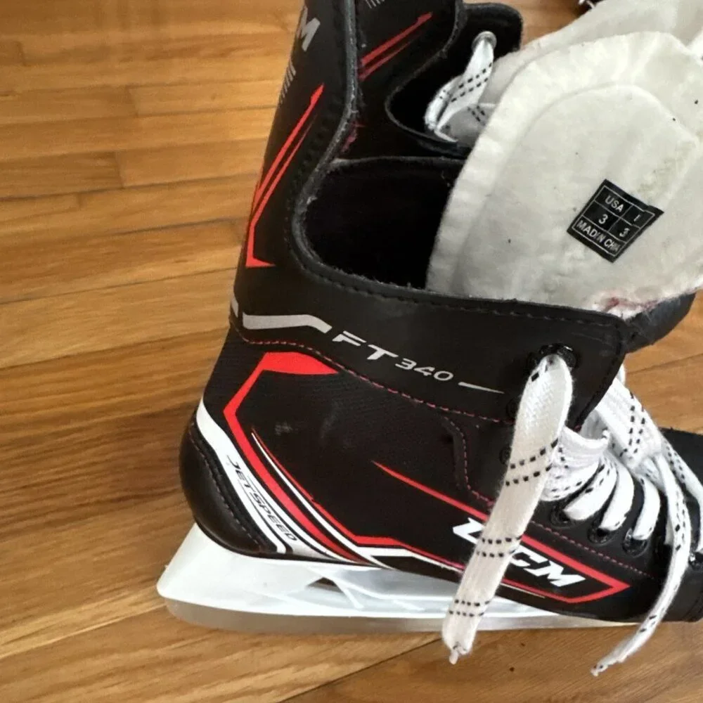 CCM Kids Black and White Ice Skates